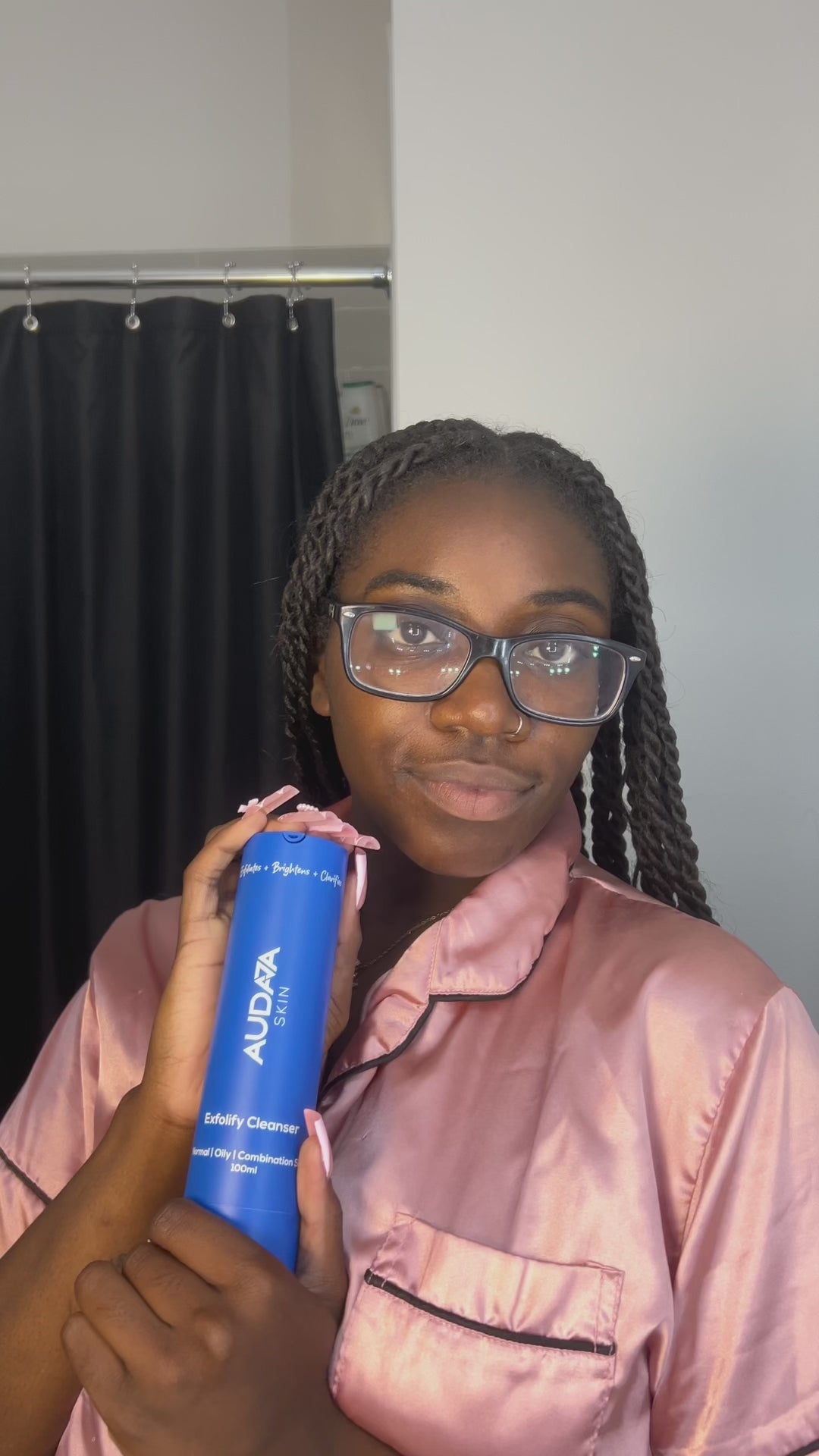 Close-up of wet skin being massaged with Exfolify Cleanser