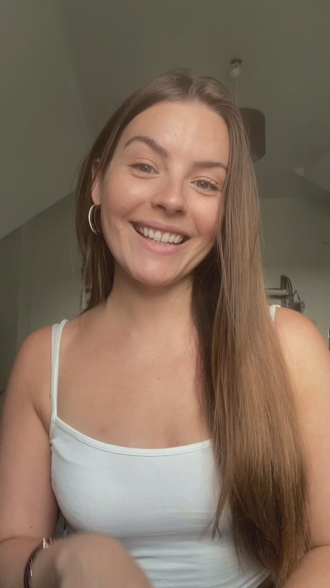 Person applying Renewify Serum with vitamin c and e