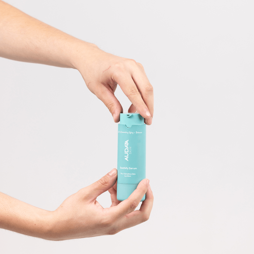 Soothify Serum on a hand, showcasing its lightweight texture